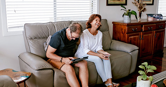 older couple sitting on the couch