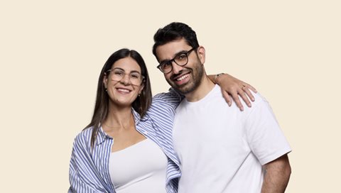 woman leaning on shoulder of partner