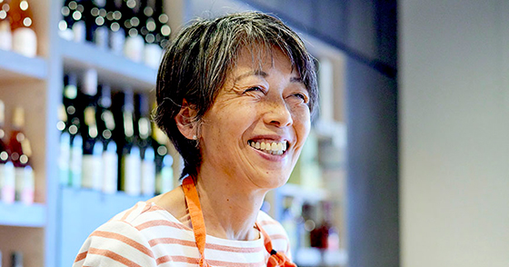 smiling lady in stripe shirt