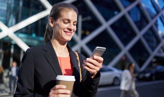 Businesswoman holding phone
