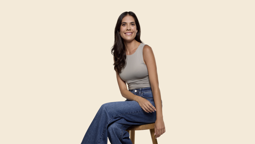 Valeria sitting on a stool