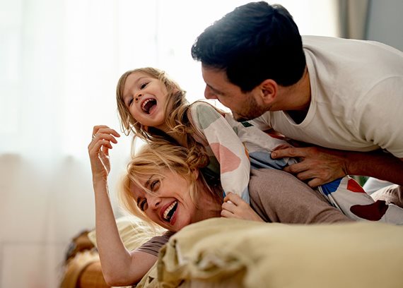 Family laughing img text