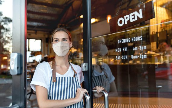business owner open cafe door
