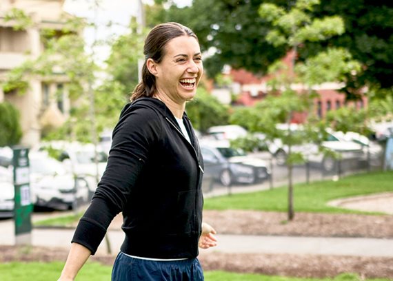 Smiling woman in a park