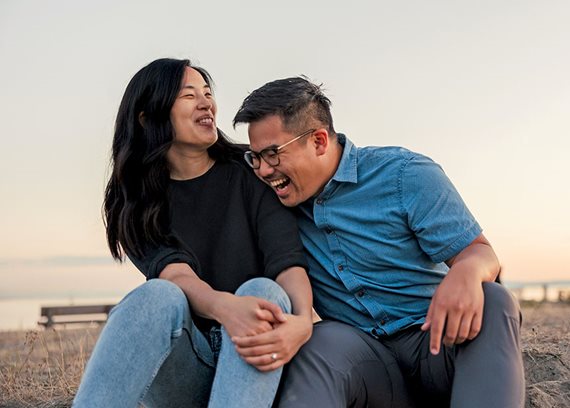 couple in front of ocean