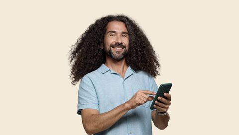 man holding mobile phone
